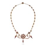 NO RESERVE - AN ANTIQUE PASTE NECKLACE comprising a row of clusters of red paste stones, suspendi...