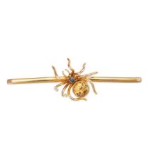 AN ANTIQUE SAPPHIRE AND ZIRCON SPIDER BAR BROOCH in 9ct yellow gold, the spider set with a cushio...