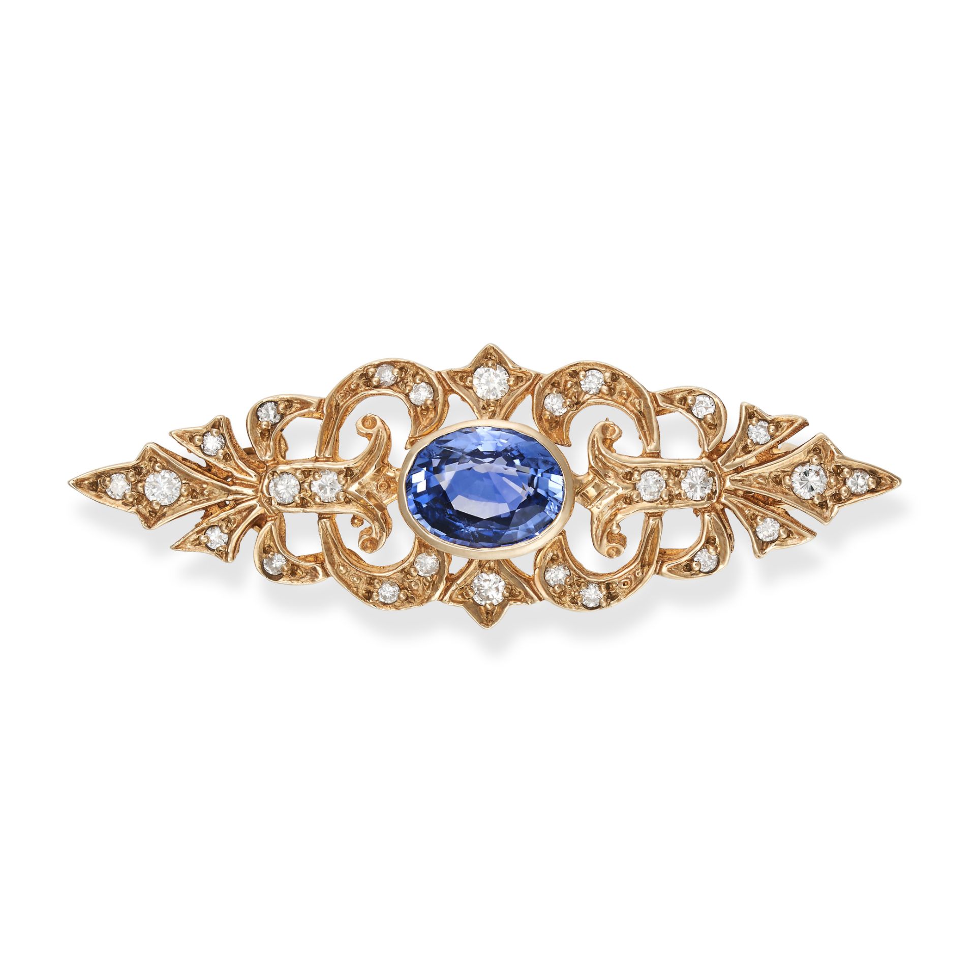 A SAPPHIRE AND DIAMOND BROOCH in 9ct yellow gold, the openwork brooch set with an oval cut sapphi...