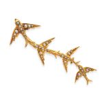 AN ANTIQUE PEARL SWALLOW BROOCH in 15ct yellow gold, designed as four swallows in flight, accente...