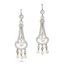 A PAIR OF PEARL AND DIAMOND DROP EARRINGS in white gold and platinum, each set with an old cut di...