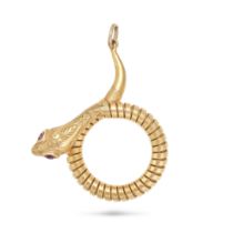 NO RESERVE - A RUBY SNAKE PENDANT in 9ct yellow gold, designed as a coiled snake with a gas pipe ...