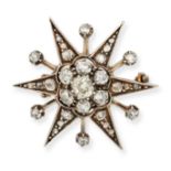 AN ANTIQUE DIAMOND STAR BROOCH in yellow gold and silver, designed as a six rayed star set throug...