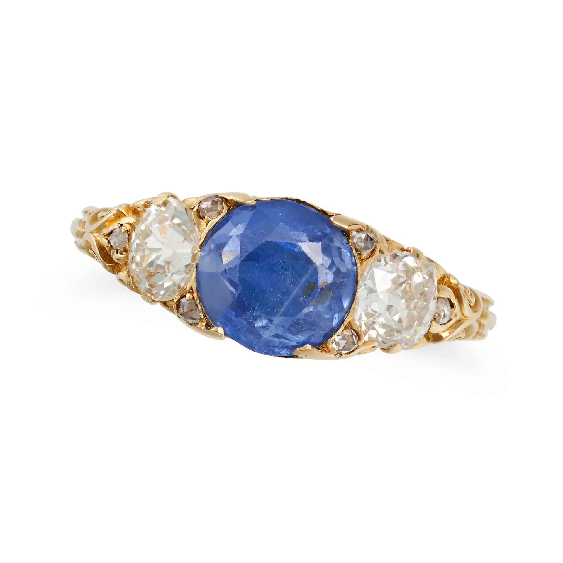 AN ANTIQUE SAPPHIRE AND DIAMOND RING in yellow gold, set with a round cut sapphire of approximate...