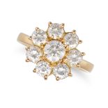 A DIAMOND CLUSTER RING in yellow gold, set with a cluster of round brilliant cut diamonds all tot...