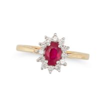 A RUBY AND DIAMOND CLUSTER RING in 18ct yellow gold, set with an oval cut ruby in a cluster of ro...