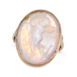 NO RESERVE - AN ANTIQUE OPAL CAMEO RING in yellow gold, set with an opal cameo carved to depict c...