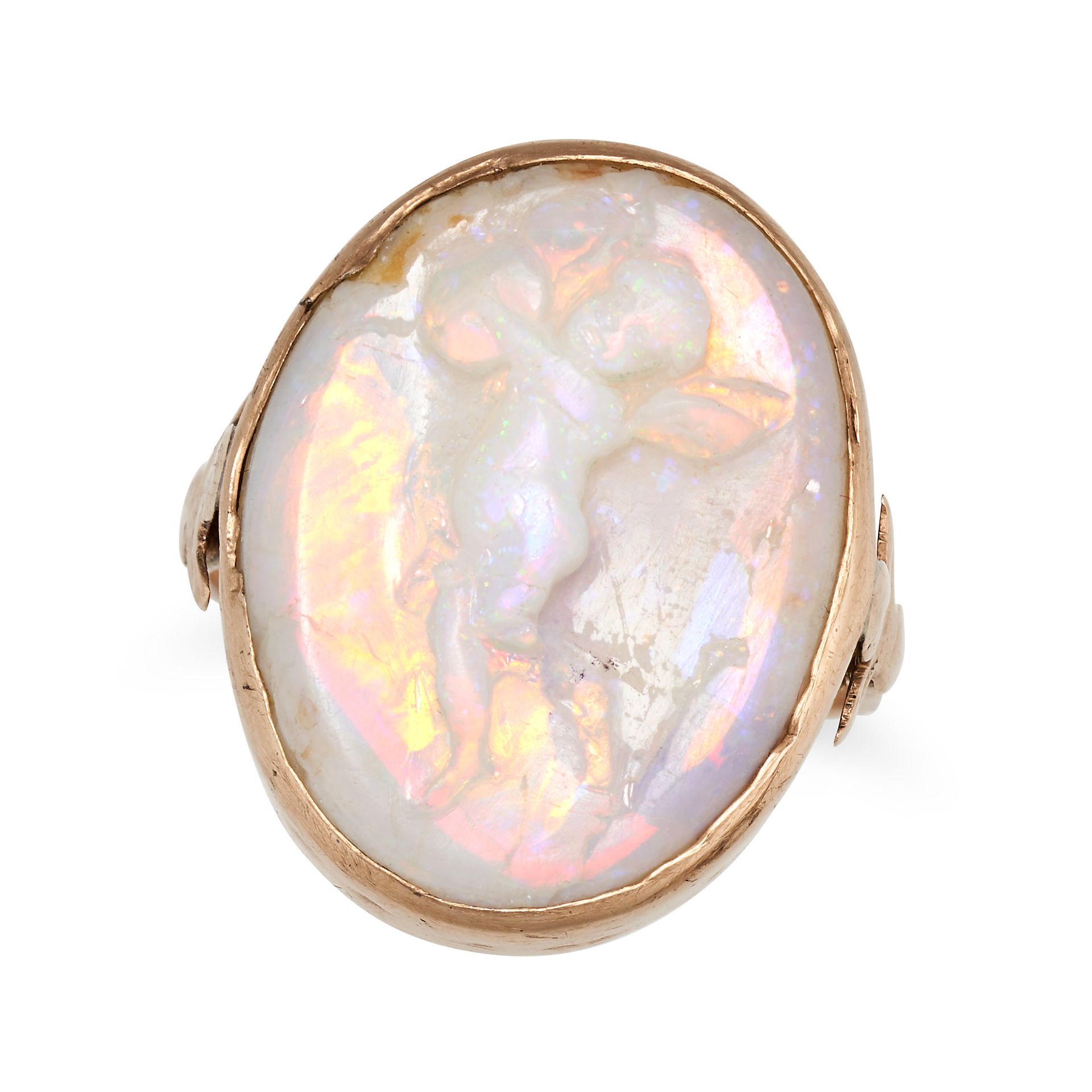 NO RESERVE - AN ANTIQUE OPAL CAMEO RING in yellow gold, set with an opal cameo carved to depict c...