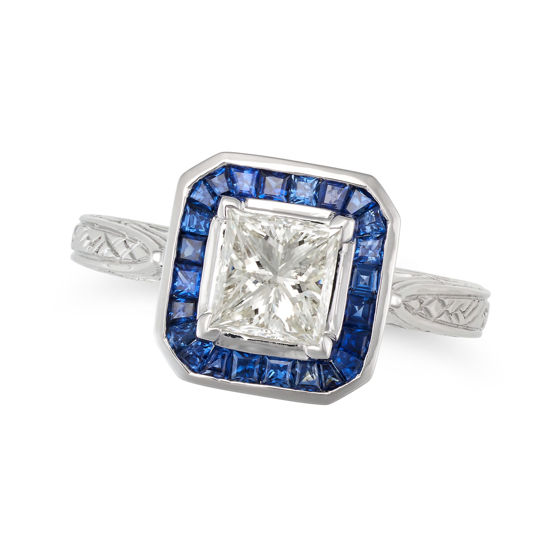 A DIAMOND AND SAPPHIRE DRESS RING in 14ct white gold, set with a princess cut diamond of approxim...