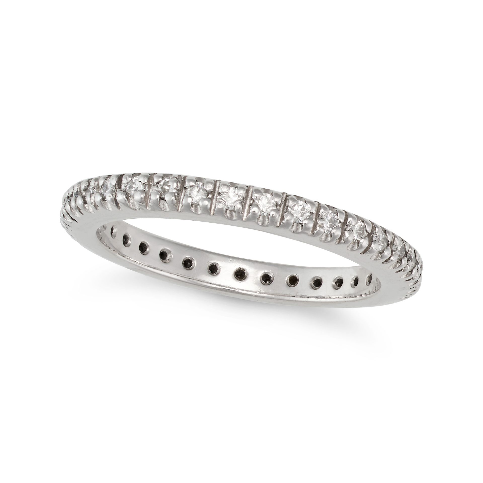 A DIAMOND ETERNITY RING in platinum, set all around with a row of round brilliant cut diamonds, s...