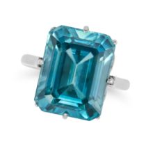 A BLUE ZIRCON RING set with an octagonal step cut blue zircon of approximately 18.19 carats, no a...