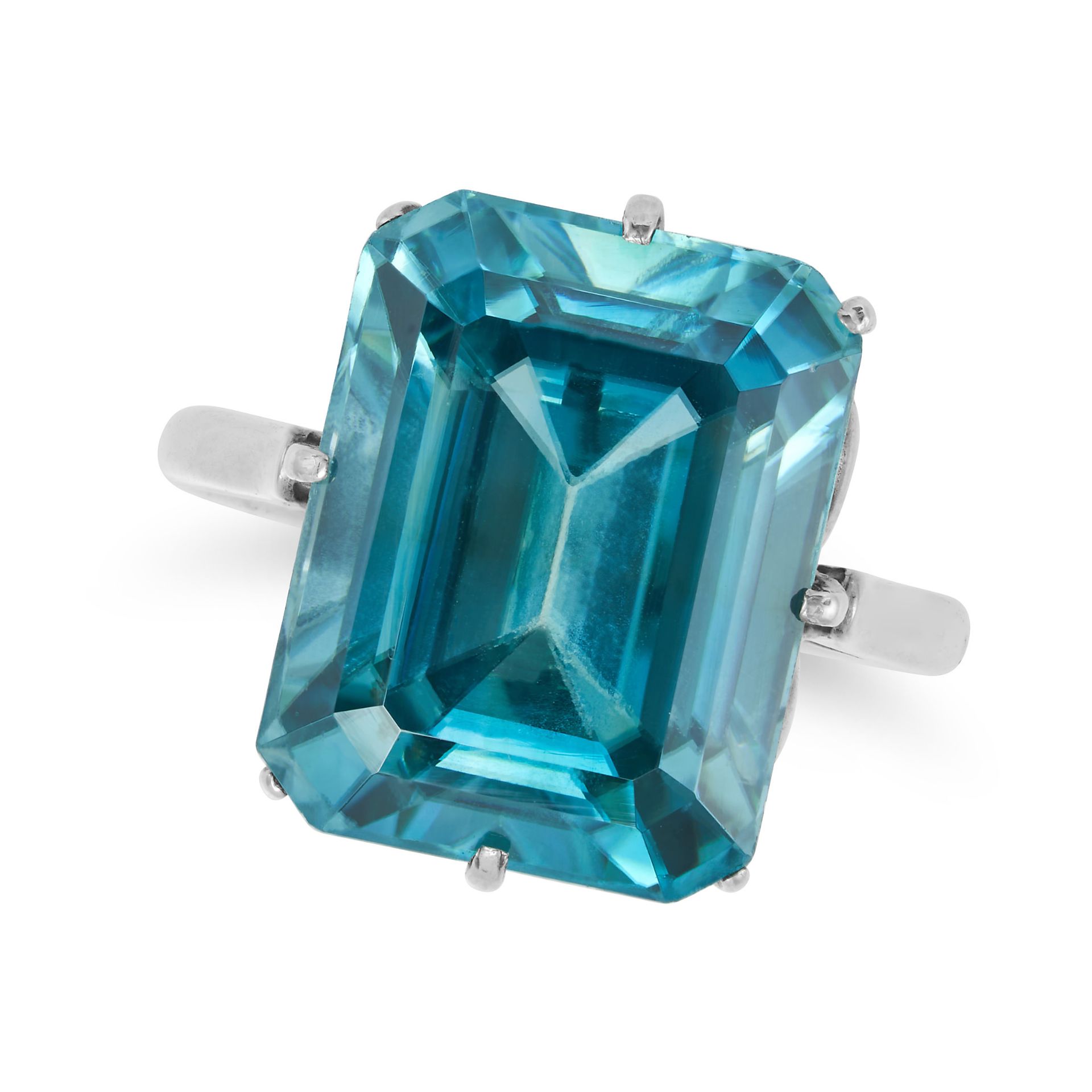 A BLUE ZIRCON RING set with an octagonal step cut blue zircon of approximately 18.19 carats, no a...