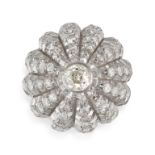 A DIAMOND BOMBE RING in 18ct white gold, the domed face set to the centre with an old cut diamond...