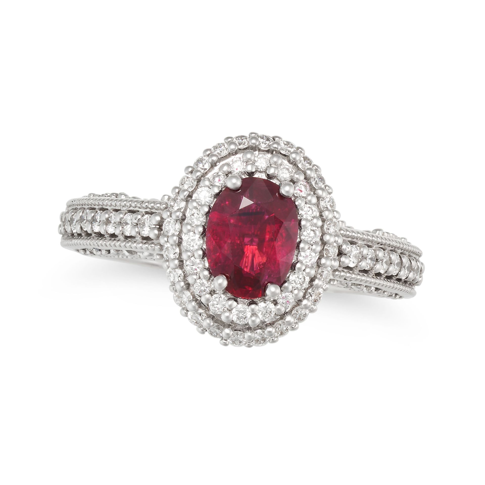 A PIGEON'S BLOOD BURMA NO HEAT RUBY AND DIAMOND RING in 18ct white gold, set with an oval cut rub...