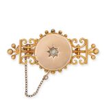 AN ANTIQUE DIAMOND LOCKET BROOCH in yellow gold, set with an old cut diamond in an engraved star ...