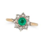 AN EMERALD AND DIAMOND CLUSTER RING in 18ct yellow gold, set with a round cut emerald in a cluste...