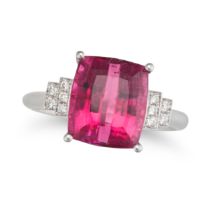 A PINK TOURMALINE AND DIAMOND RING in 18ct white gold, set with a fancy cut pink tourmaline of 5....