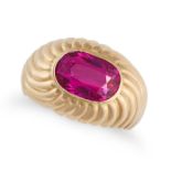 CARTIER, AN UNHEATED RUBY RING in 18ct yellow gold and platinum, the fluted ring set with an oval...