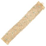 BUCCELLATI, A TURQUOISE BRACELET in 18ct yellow gold, the woven bracelet set with square turquois...