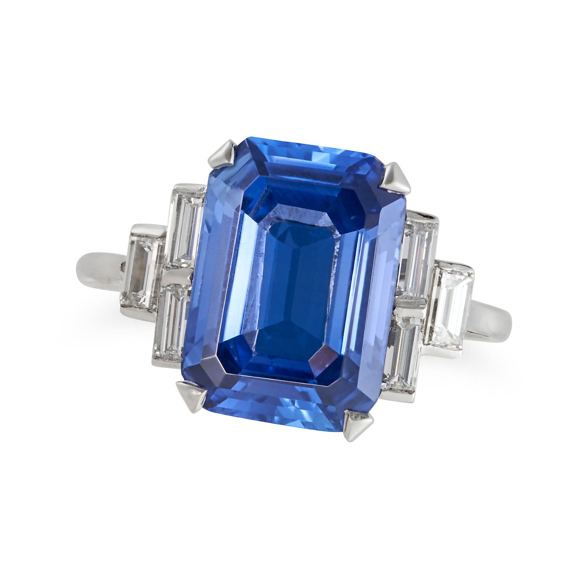 A CEYLON NO HEAT SAPPHIRE AND DIAMOND RING in platinum, set with an octagonal step cut sapphire o...