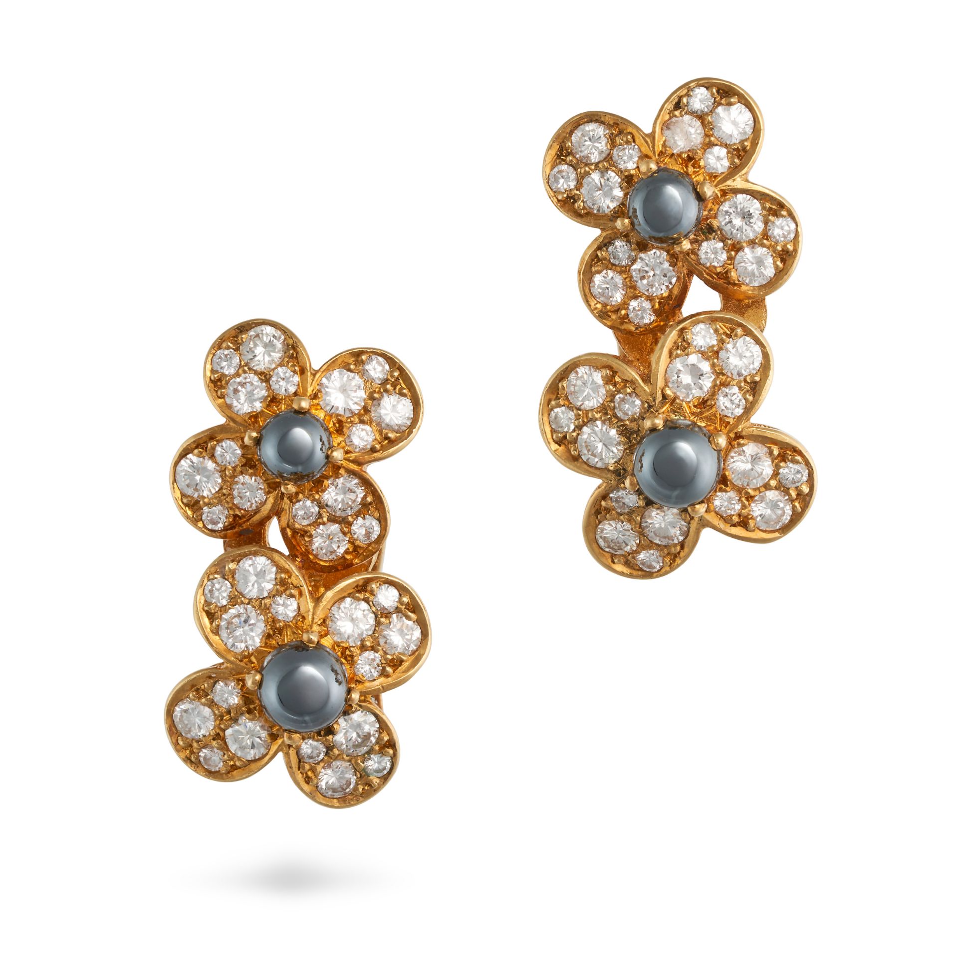 VAN CLEEF & ARPELS, A PAIR OF HEMATITE AND DIAMOND TREFLE CLIP EARRINGS in 18ct yellow gold, each...