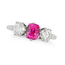 AN UNHEATED RUBY AND DIAMOND THREE STONE RING in 18ct white gold, set with a cushion cut ruby of ...