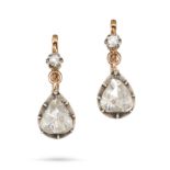A PAIR OF DIAMOND DROP EARRINGS in yellow gold and silver, each set with an old cut diamond suspe...