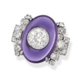 A FINE ART DECO AMETHYST AND DIAMOND RING in platinum, set with an oval cabochon amethyst inlaid ...