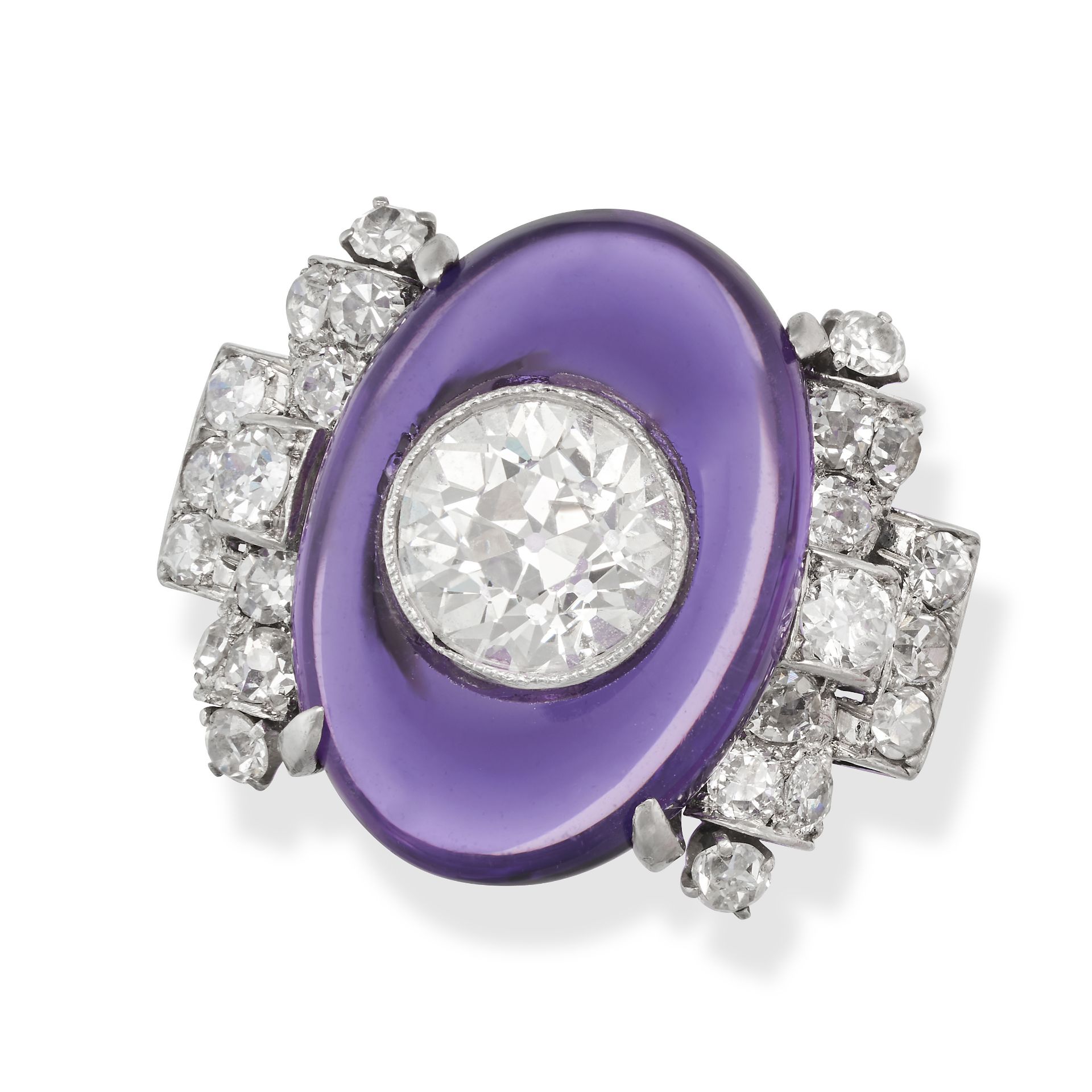 A FINE ART DECO AMETHYST AND DIAMOND RING in platinum, set with an oval cabochon amethyst inlaid ...