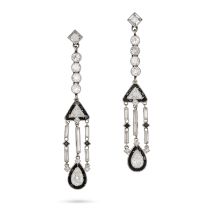 A PAIR OF ART DECO DIAMOND AND ONYX DROP EARRINGS in 18ct yellow and white gold, each set with sq...