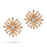 VERDURA, A PAIR OF DIAMOND RAY EARRINGS in yellow gold, each designed as an X motif set with roun...
