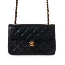 CHANEL VINTAGE QUILTED FLAP BAG Condition grade C+. Produced between 1989 and 1991. 22cm long, ...
