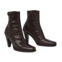 PRADA BROWN HEELED ANKLE BOOTS Condition grade B-. Size 35.5. Heel height 10cm. Brown toned l...