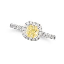 A FANCY INTENSE YELLOW DIAMOND RING in platinum, set with a cushion cut fancy intense yellow diam...