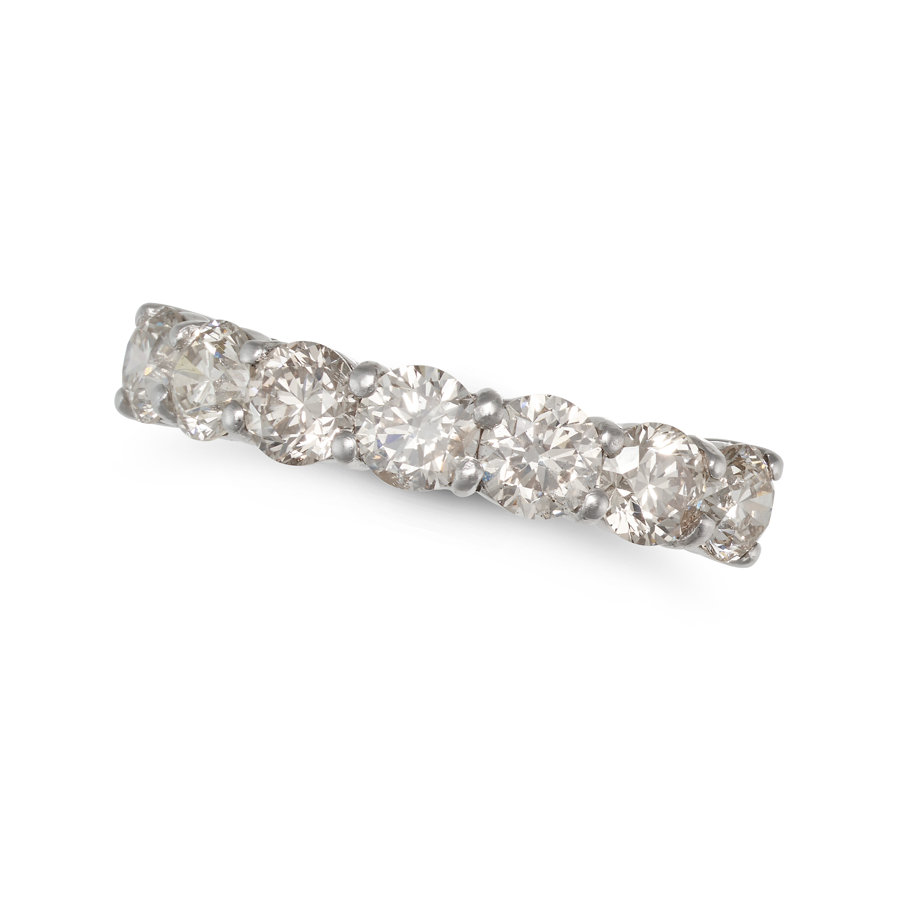 A DIAMOND HALF ETERNITY RING in 18ct white gold, set with seven round brilliant cut diamonds all ...