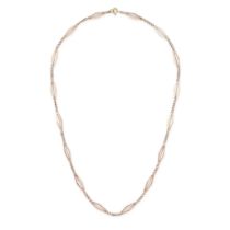 A GOLD CHAIN NECKLACE in rose gold, comprising a row of curb and fancy links, clasp stamped 750, ...