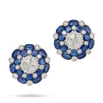 A PAIR OF SAPPHIRE AND DIAMOND EARRINGS in 18ct white gold, each set with a cluster of marquise a...