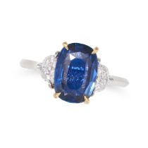 A SAPPHIRE AND DIAMOND THREE STONE RING in 18ct white gold, set with a cushion cut sapphire of 2....