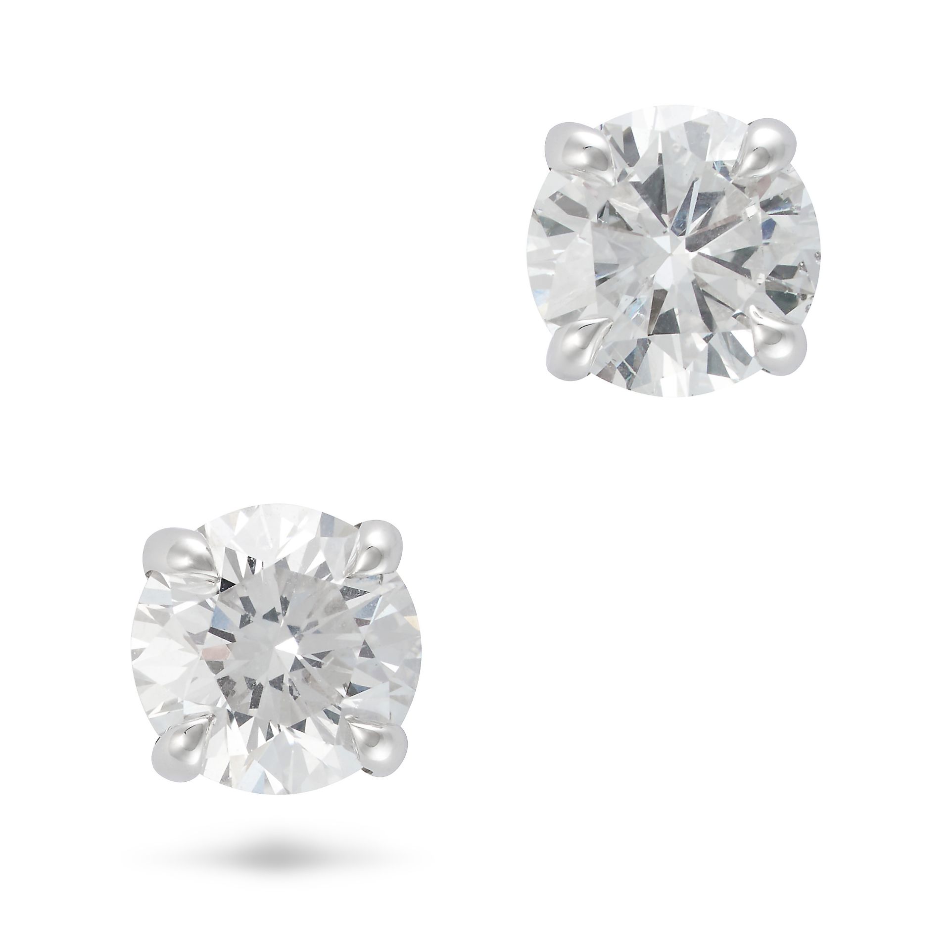 A PAIR OF DIAMOND STUD EARRINGS in 18ct white gold, each set with around brilliant cut diamond, t...