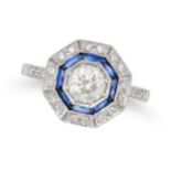 A DIAMOND AND SAPPHIRE TARGET RING in 18ct white gold, set with a round brilliant cut diamond in ...