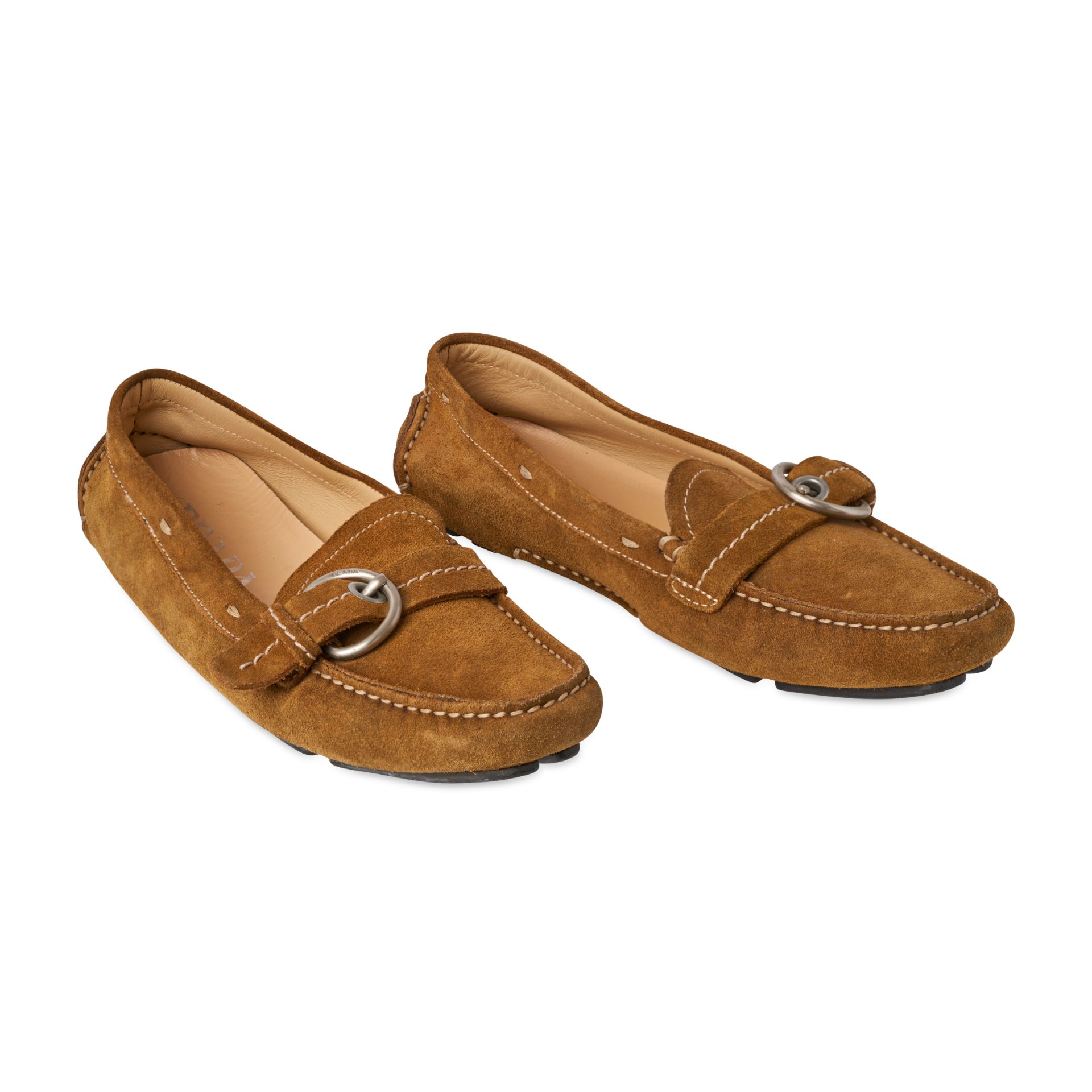 PRADA TAN SUEDE BUCKLED LOAFERS Condition grade C+. Size 35.5. Brown toned suede loafers with b...