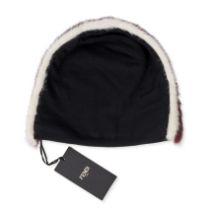FENDI FUR TRIMMED BEANIE HAT Condition grade A, new with tags. Black and grey toned beanie with b...