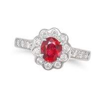 AN UNHEATED RUBY AND DIAMOND RING in 18ct white gold, set with an oval cut ruby of 1.10 carats in...