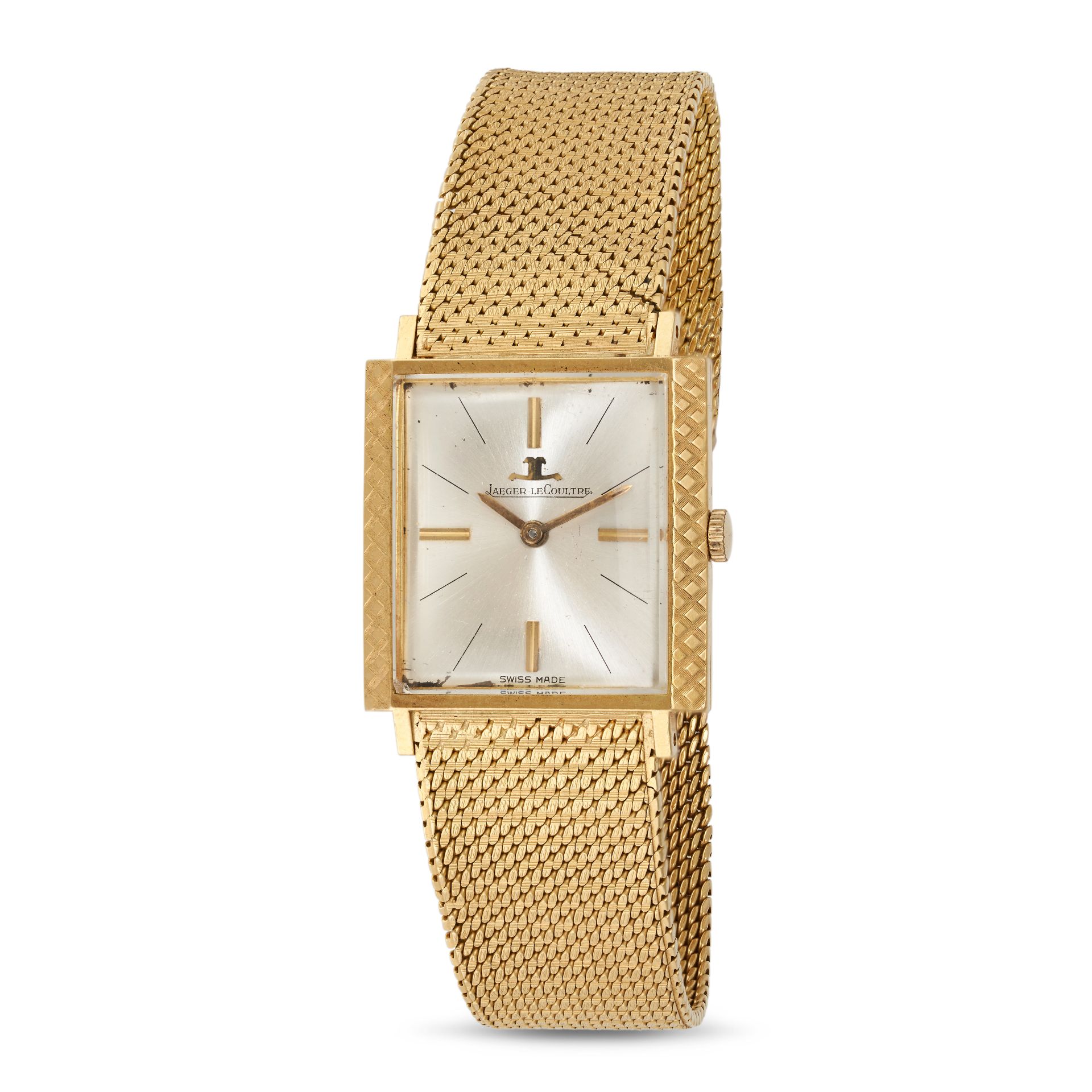 JAEGER LECOULTRE - A VINTAGE JAEGER LECOULTRE WRISTWATCH in 18ct yellow gold, the rectangular sil...