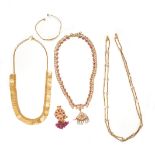 A MIXED LOT OF GOLD JEWELLERY in high carat yellow gold, one pendant, three necklaces, one gemset...