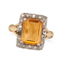 A CITRINE AND DIAMOND CLUSTER RING in 18ct yellow gold, set with an emerald cut citrine in a bord...