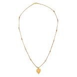 A YELLOW GOLD PENDANT NECKLACE in 22ct gold, a pendant suspended from a chain with intersecting w...