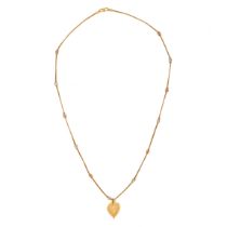 A YELLOW GOLD PENDANT NECKLACE in 22ct gold, a pendant suspended from a chain with intersecting w...