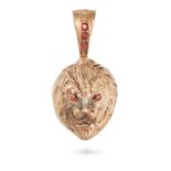 A LION HEAD PENDANT in 9ct gold, set with five red gemstones, stamped 375, 36.6g.