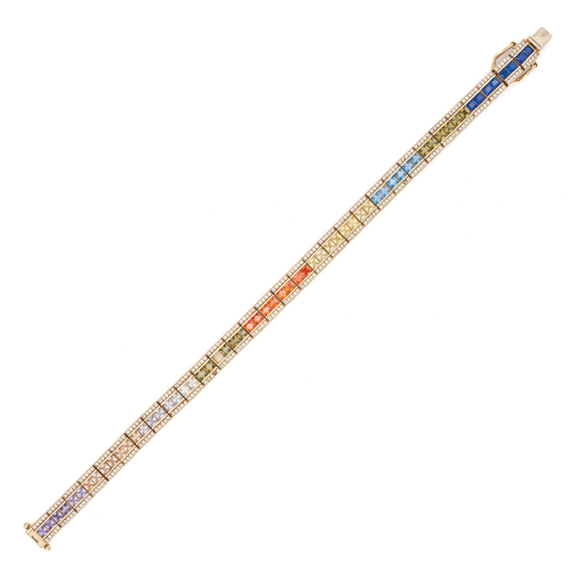 A GEMSET RAINBOW BRACELET in 14ct yellow gold, one stone missing, stamped 585, 14.2g.